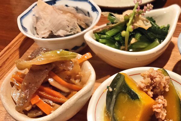 Small food plates on kyoto food tour