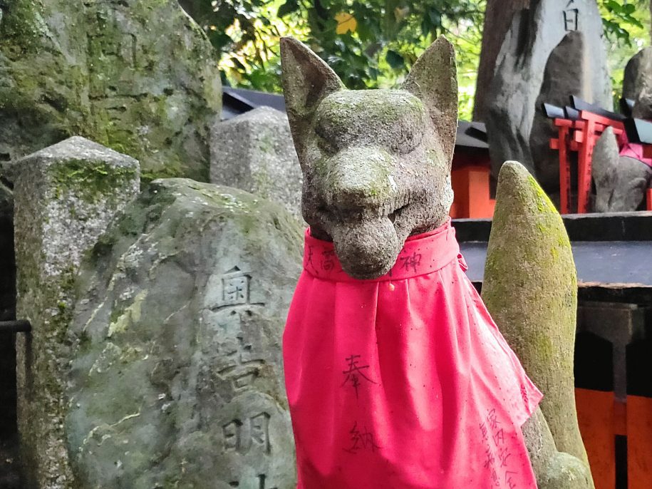 One of Fushii Inari Shrine's famous dog statues.